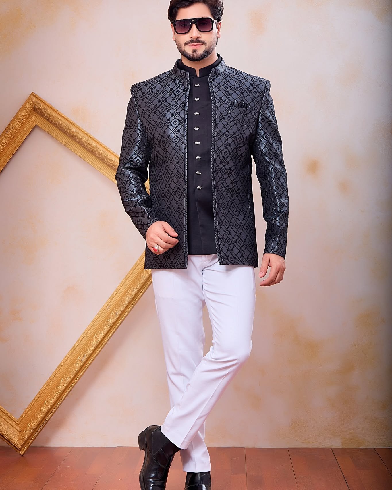 Step into effortless elegance with this Designer Gray & Black 3-Piece Jodhpuri Jacket for Men Crafted from premium Imported Jacquard Fabric, this stylish ethnic outfit features an eye-catching geometric pattern and a sophisticated royal finish. Perfect for weddings, receptions, engagements, parties and special occasions.